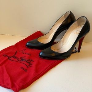 Christian Louboutin black leather pumps